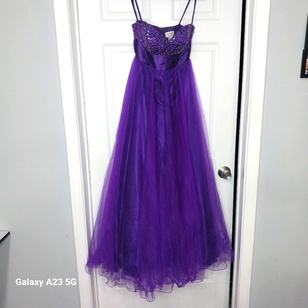 Purple strapless prom dress with sequin bust and pleated waistband, size 4.